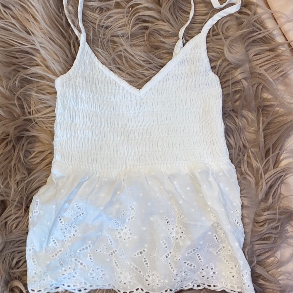 fashionable white peplum top